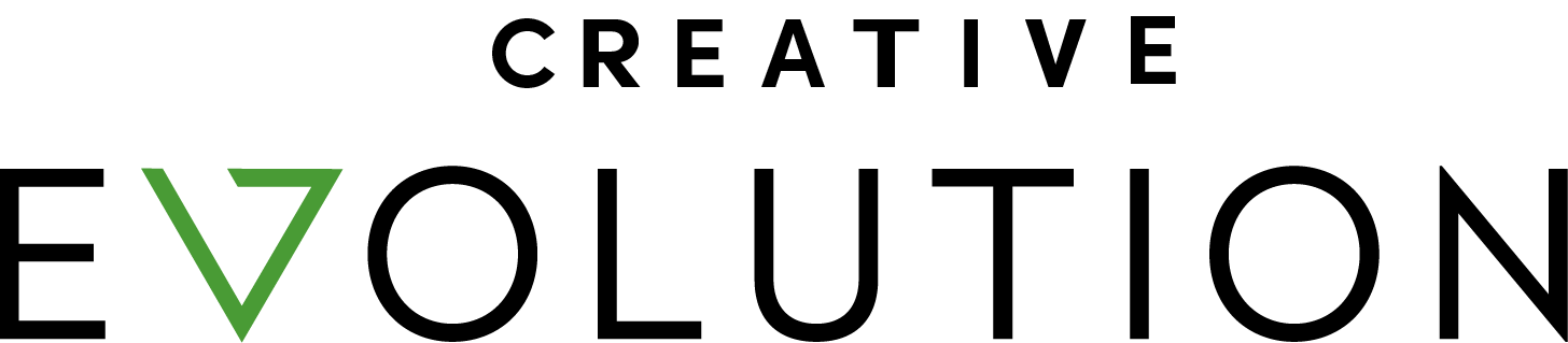 Large black text spells EVOLUTION on a light gray background, with the V depicted as a green triangle. The word CREATIVE appears in smaller, faint black letters above EVOLUTION.